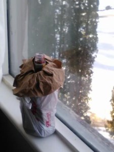 Who's booze was left behind on the window sill of my hotel room?